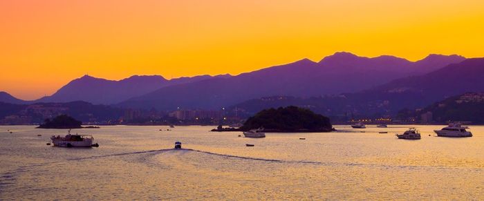 Scenic view of mountains at sunset