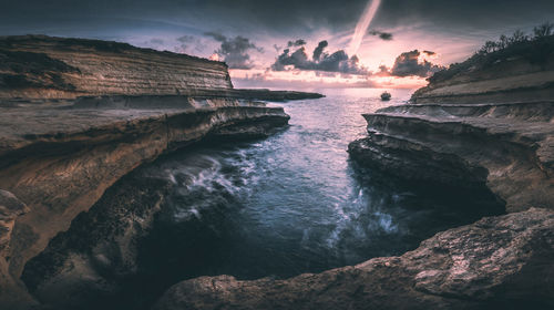 Scenic view of sea against sky during sunset