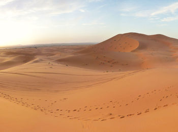 Scenic view of desert against sky