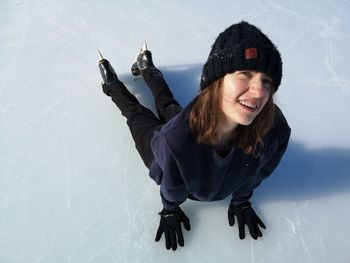 Portrait of smiling young woman in winter