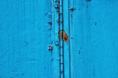 Close-up of weathered blue door