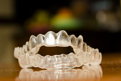 Close-up of dentures on table