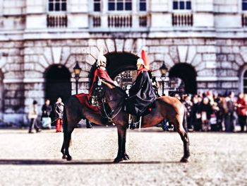 Man riding horse cart