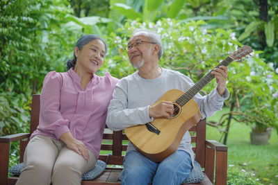 Friends playing guitar