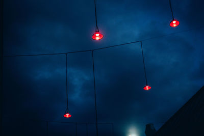 Low angle view of illuminated building at night