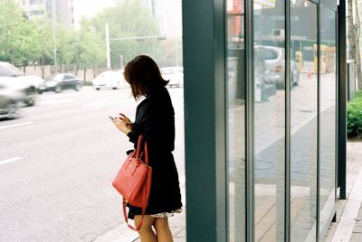 Young woman using smart phone