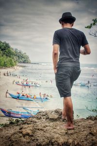 Rear view of man on beach