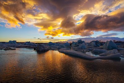 Panoramic view of sea against sky during sunset