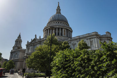 Side of st paul's cathedral with side trees, london.