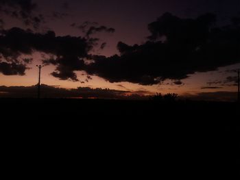 Scenic view of silhouette landscape against sky during sunset