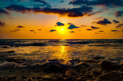 Scenic view of sea against sky during sunset