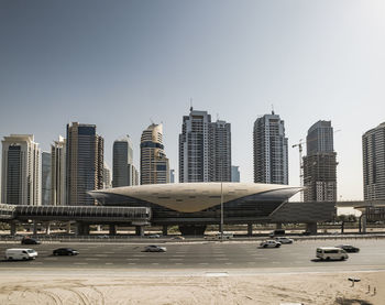 Modern buildings in city against clear sky