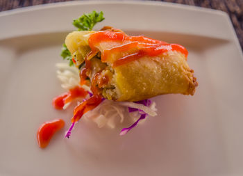 High angle view of fish in plate on table