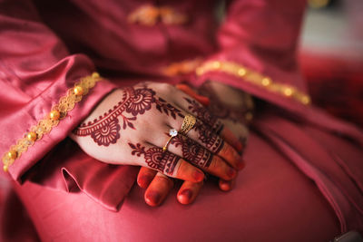 Henna is traditional malay decorative art. close-up.