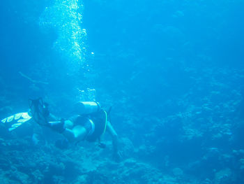 People swimming in sea