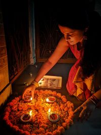 Young woman preparing food at home