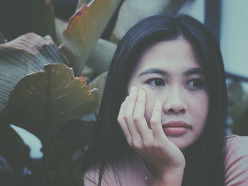 Close-up portrait of young woman