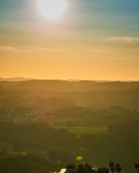 Scenic view of silhouette landscape against sky during sunset