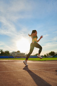 Full length of woman running