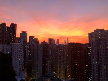 Cityscape against sky during sunset