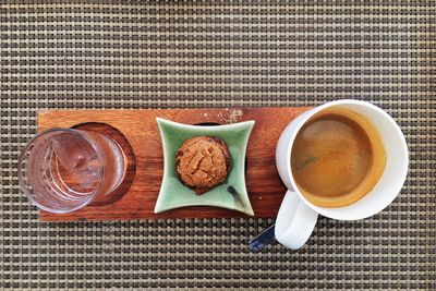 Close-up of coffee served on table