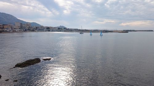 Scenic view of sea against cloudy sky