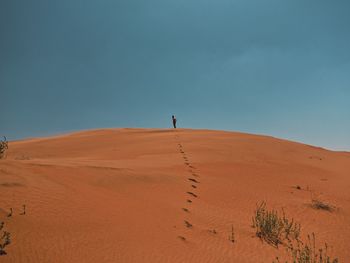 Scenic view of desert against sky