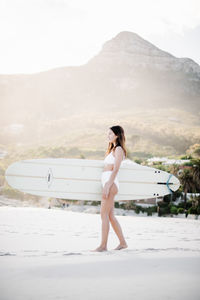 Full length of woman standing on land