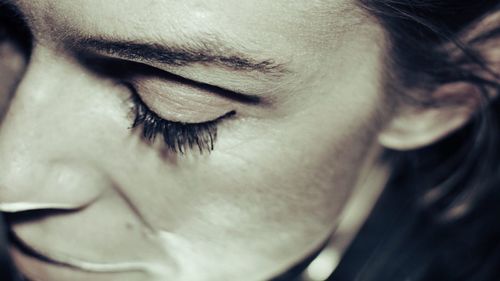 Close-up of woman with eyes closed