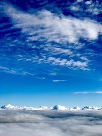 Low angle view of cloudscape against blue sky