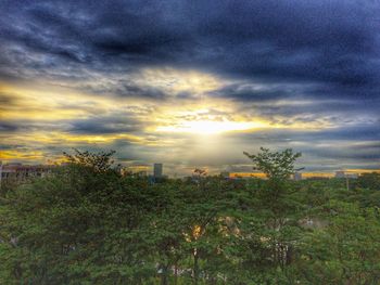 Scenic view of landscape against cloudy sky