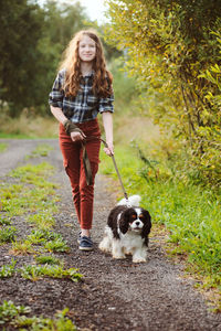 Portrait of woman with dog