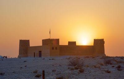 View of fort against sky during sunset