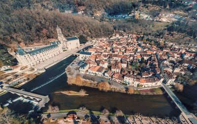 High angle view of river amidst buildings in city