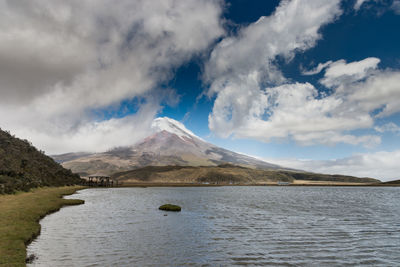 Scenic view of lake with mountains in background