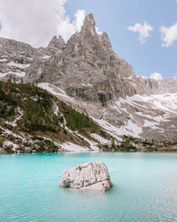 Scenic view of lake and mountain during winter