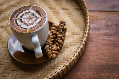 High angle view of coffee beans on table