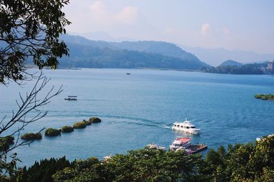 Scenic view of bay against sky