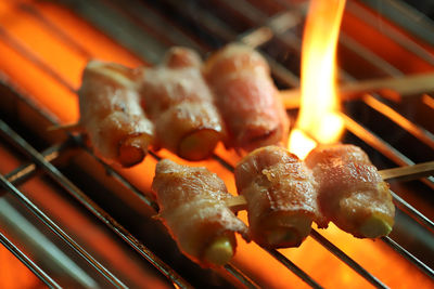 Close-up of meat on barbecue grill