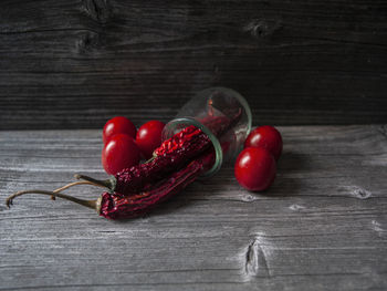 High angle view of red chili peppers on table