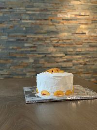 Close-up of cake served on table