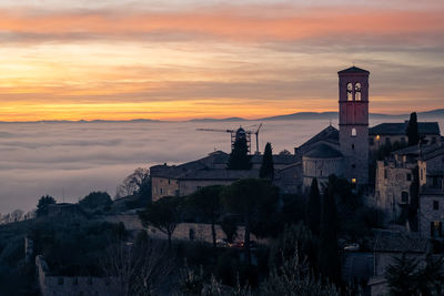 The sun sets over the historic town of assisi