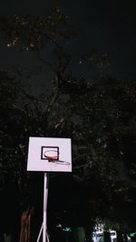 Low angle view of basketball hoop against sky