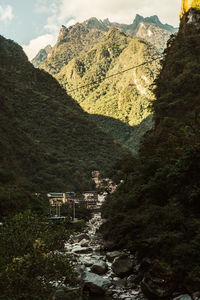 High angle view of trees and mountains against sky