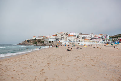 Panoramic view of beach against sky in city