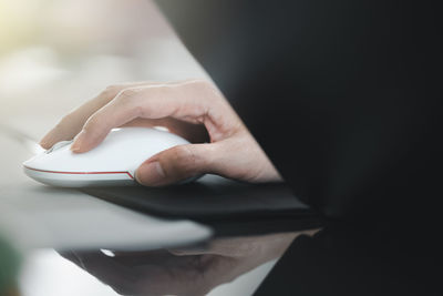 Close-up of woman using mobile phone