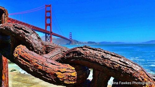 Golden gate bridge against blue sky