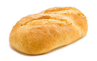 Close-up of bread against white background