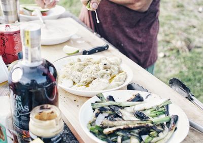 Man preparing food on table
