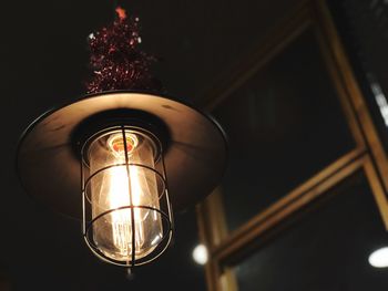 Low angle view of illuminated light bulb